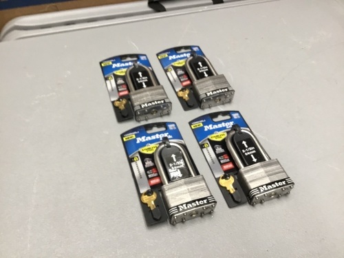 Lot of (4) Master Locks, 2-1/2 in. Laminated Stainless Steel Keyed Padlocks with 2-1/2 in. shaft. New - Lot 303