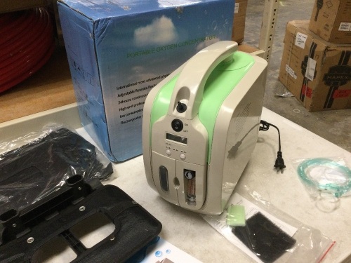 Portable Oxygen Concentrator Kit. SEE PICTURES. Powers Up, Blows Out Air, Not Tested Further. E-Commerce Return - Lot 427
