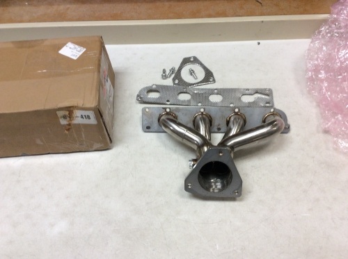Exhaust Manifold 674-418. Appears New - Lot 852