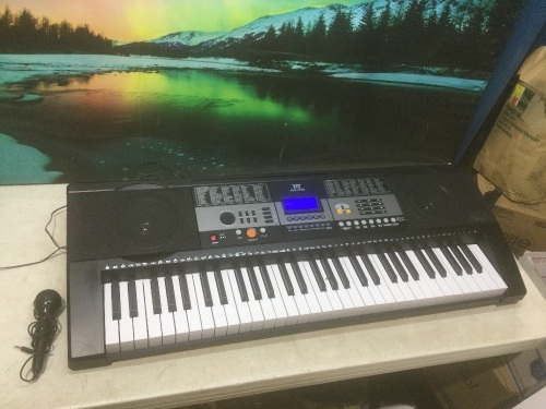61 Touch Sensitive Keys Portable Electronic Keyboard - Lot 583