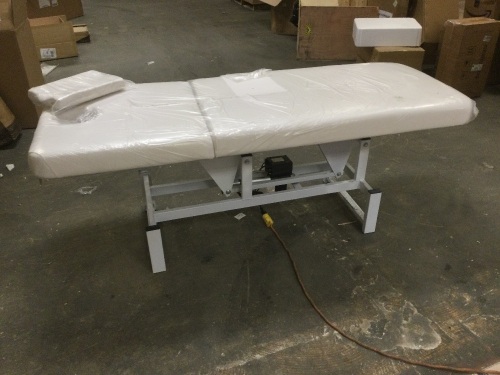 Single Motor Electric Exam/Spa/Massage Table. Works. New with Cut in Upholstery. SEE PICTURES - Lot 55