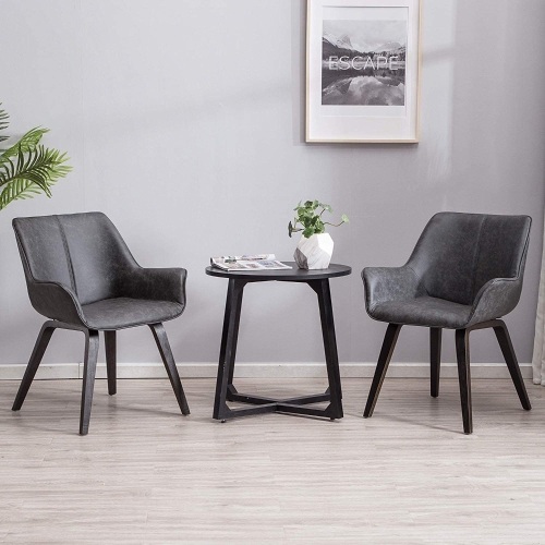 Charcoal PU Leather Contemporary Living Room Chairs (Set of 2). Appear New. Table Not Included - Lot 944
