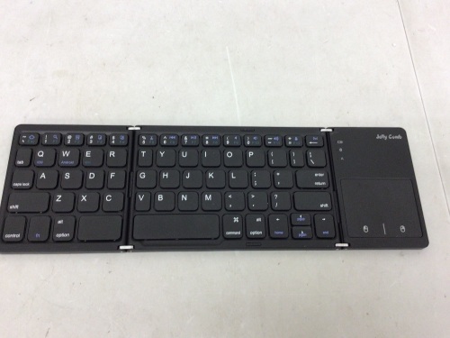 Jelly Comb Foldable Bluetooth Keyboard, Missing Cord, Powers Up, E-Commerce Return - Lot 35