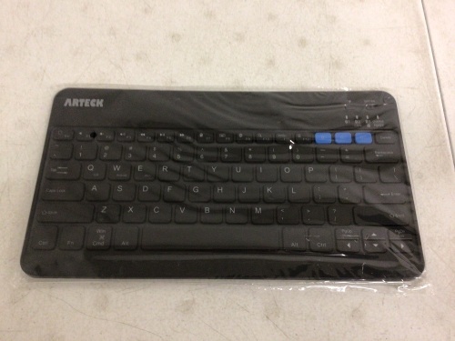Arteck Wireless Keyboard, Missing Cord, Powers Up, Appears New - Lot 715