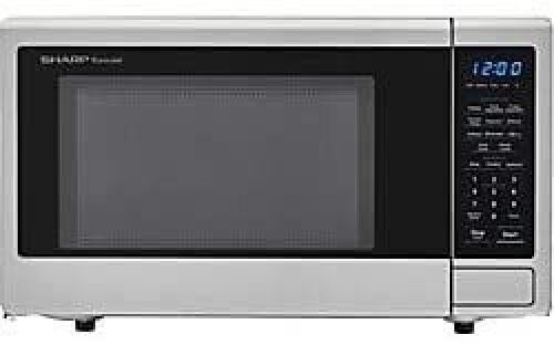 SHARP Countertop Microwave 1.1 cu. ft. Capacity with 1000 Cooking Watts in Stainless Steel - Lot 356