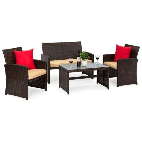 4-Piece Outdoor Wicker Conversation Patio Set w/ 4 Seats, Glass Table Top. Appears New - Lot 62