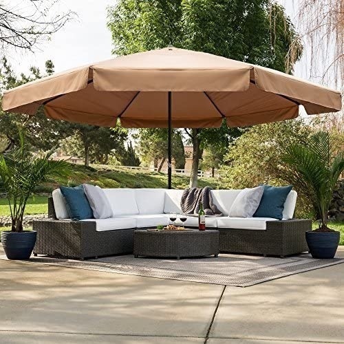 16ft Outdoor Patio Market Umbrella w/Cross Base, Crank & Air Vent , Tan. Appears New (Umbrella & Base Only - Other Items Pictured Not Included.). - Lot 104