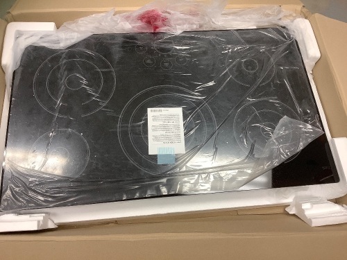 LG 36 in. Cooktop in Black with 5 Elements, SmoothTouch Controls and Warming Zone, Retail: $1,299, Appears New, Sold as is - Lot 61