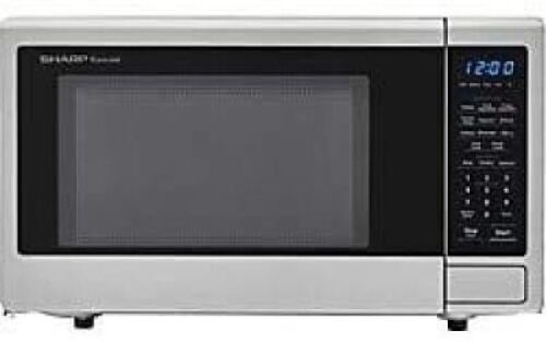 SHARP Countertop Microwave 1.1 cu. ft. Capacity with 1000 Cooking Watts in Stainless Steel - Lot 603