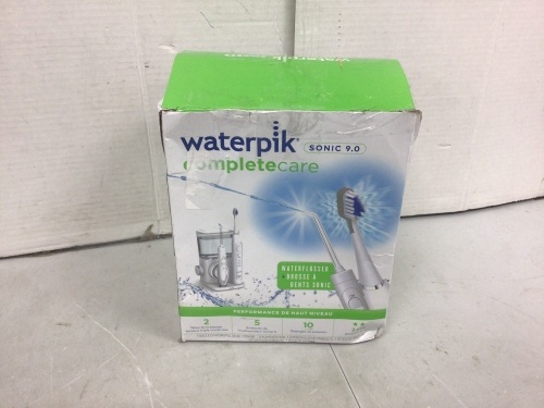 Waterpik Toothbrush & Water Flosser, New, Retail $139.99 - Lot 729