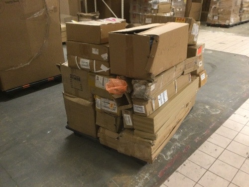 Pallet of New Auto Parts. Includes Hubs, Driveshafts, Lights, and More - Lot 81