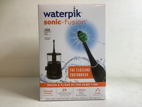Waterpik Flossing Toothbrush, Powers Up, Appears New - Lot 338
