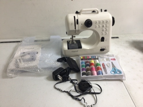 Magicfly 12 Stitch Sewing Machine, Appears New - Lot 46