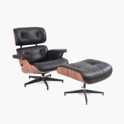 Mid Century Modern Leather Chair with Ottoman. Appears New - Lot 24