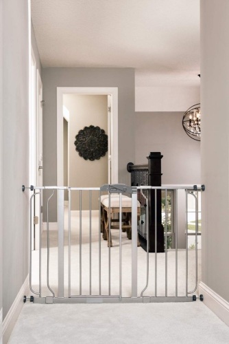 Regalo Easy Step 49-Inch Extra Wide Baby Gate, Includes 4-Inch and 12-Inch Extension Kit, 4 Pack of Pressure Mount Kit and 4 Pack of Wall Mount Kit. Appears New - Lot 659