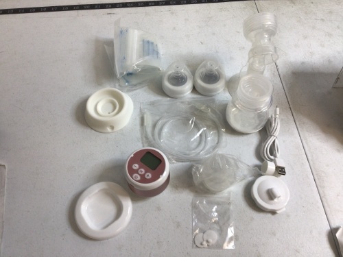Optimal Dual Use Breast Pump, Powers Up, E-Commerce Return - Lot 193