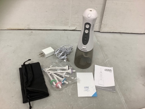 Portable Oral Irrigator, Powers Up, E-Commerce Return - Lot 717