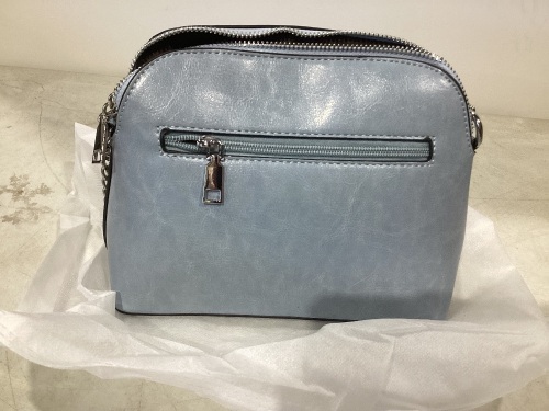 Case of Blue Cluci Leather Purses.  - Lot 923