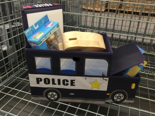 Police toy box with toys appears new - Lot 179