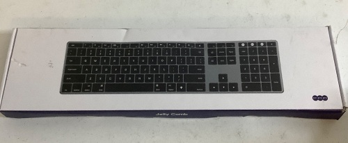 Jelly Comb Keyboard, Powers Up, Appears New - Lot 356