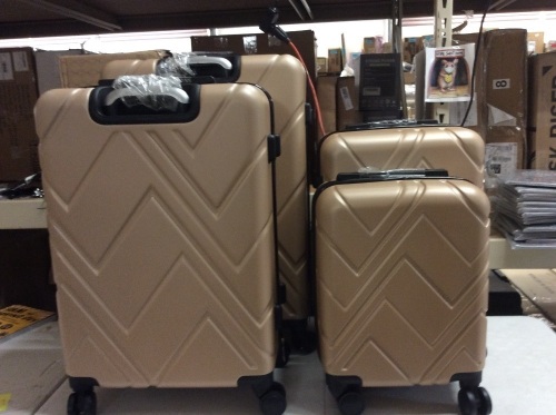 4 Piece Champagne Gold Rolling Luggage - Appears New  - Lot 627