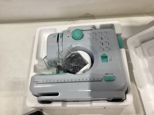 6V Portable Foot Pedal Sewing Machine w/ 12 Stitch Patterns - Lot 734