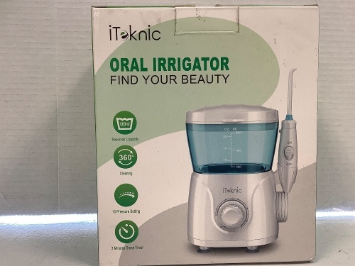 iTeknic Oral Irrigator, Powers Up, E-Comm Return - Lot 720