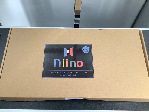 Lot of (4) Niino Sling Puck/Tic Tac Toe Board, Appears New - Lot 298