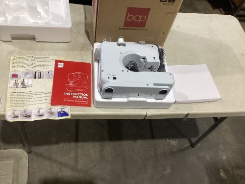 6V Portable Foot Pedal Sewing Machine w/ 12 Stitch Patterns, used 