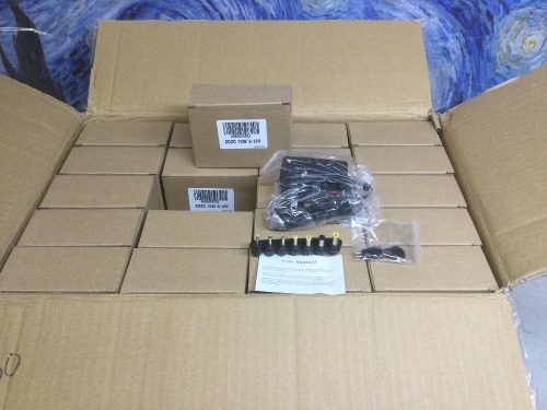 Case of (100) ZOZO Universal AC Adapters 12W 3-12V - New - Lot 318