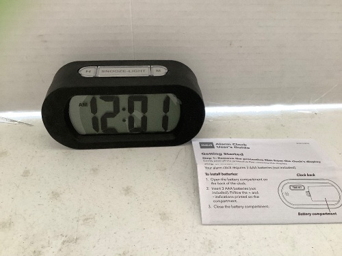RCA Portable Alarm Clock, Powers Up, Appears New - Lot 77