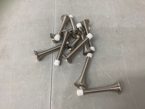 Amazon Basics Spring Door Stops, Appears new, Retail 14.00 - Lot 369