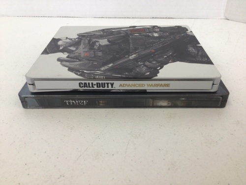Lot of 2 PS4 Steelbook Games, Thief, and Call of Duty Advanced Warfare, E-Commerce Return - Lot 223