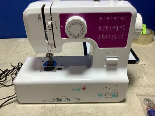 Sewing Machine and Accessories - Lot 1148