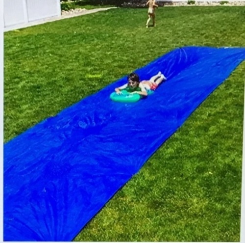 BACKYARD BLAST - 50'x 10' Heavy Duty Waterslide - IncludesRider, Sprinkler, Carrying Bag - Extra Thick to Prevent Tears &Rips - Easy to Assemble, Like New, retail - $109 - Lot 135