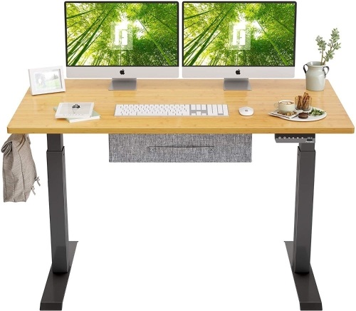 FEZIBO Electric Height Adjustable Standing Desk with Drawer, 48" x 24" Splice Board, Black Frame/Bamboo Top - Appears New - Lot 71