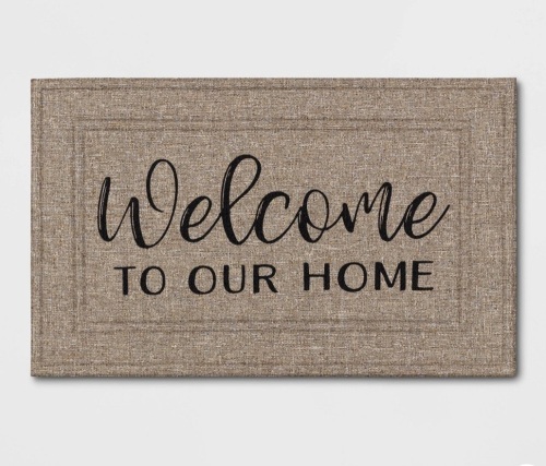 1'6"x2'6" "Welcome to Our Home" Mat Tan - Apache Mills, Like New Retail - $12.99 - Lot 281