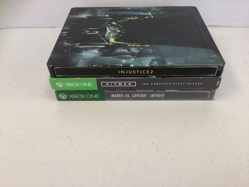 Lot of 3 Xbox One Steelbook Games, Injustice 2, Hitman The Complete First Season, and Marvel VS. Capcom : Infinite, E-Commerce Return - Lot 218