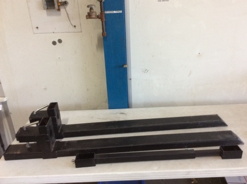 Clamp On Pallet Forks - One is Damaged  - Lot 410