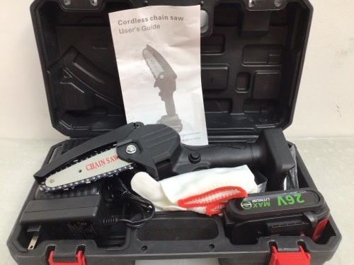 Mini Chainsaw, Powers Up, Appears New - Lot 221