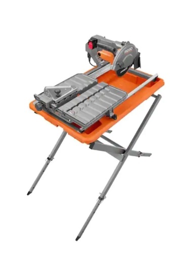 Rigid 9 Amp Corded 7 in. Wet Tile Saw with Stand - Blade Guard Won't Stay Shut  - Lot 50