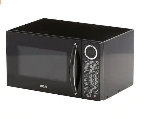 RCA 0.9 cu. ft. Countertop Microwave - Lot 177
