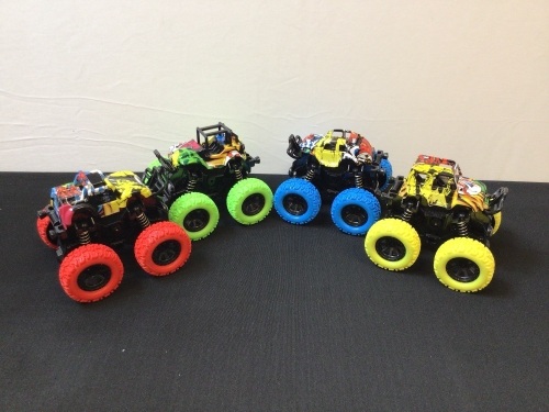 Lot of (4) Small Toy Monster Trucks - Lot 144