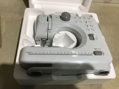 6V Portable Foot Pedal Sewing Machine w/ 12 Stitch Patterns - Missing Pieces - Lot 581