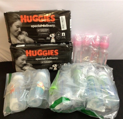 2 pkgs Huggies Newborn Diapers & Misc Dr. Brown's Bottles - Lot 57