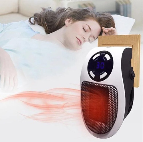 Plug In Portable Mini Electric Fan Heater - Lot 316