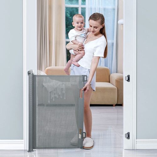 BabyBond Retractable Baby Gate 33" x 71"  - Lot 614