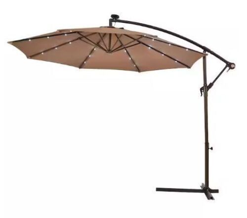 10 ft. Cantilever Hanging Solar LED Sun Shade Patio Umbrella in Tan with Cross Base - Lot 502