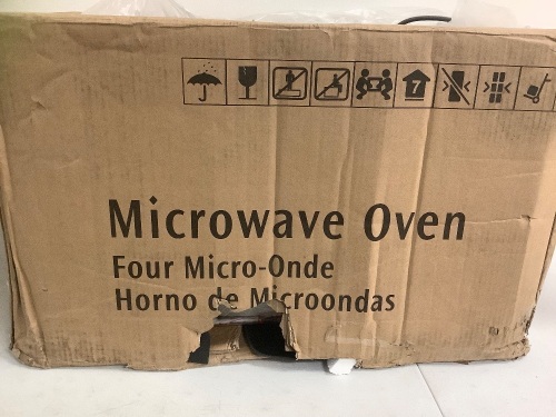Stainless Microwave, Appears New w/ Box Damage, Powers Up, Sold as is - Lot 332