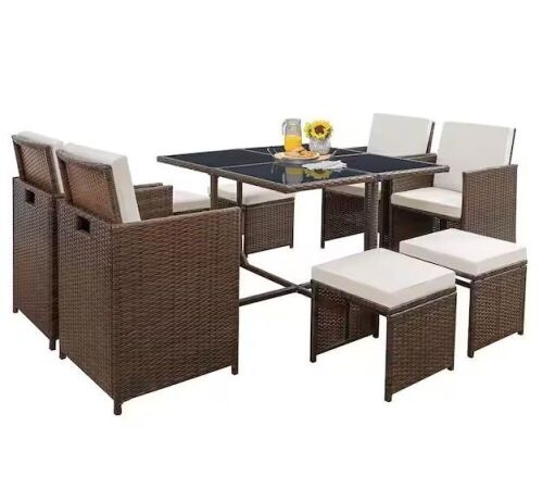 Tozey Brown 9-Piece Rattan Wicker Outdoor Dining Set with Washed Beige Cushion and Glass Table - Lot 51